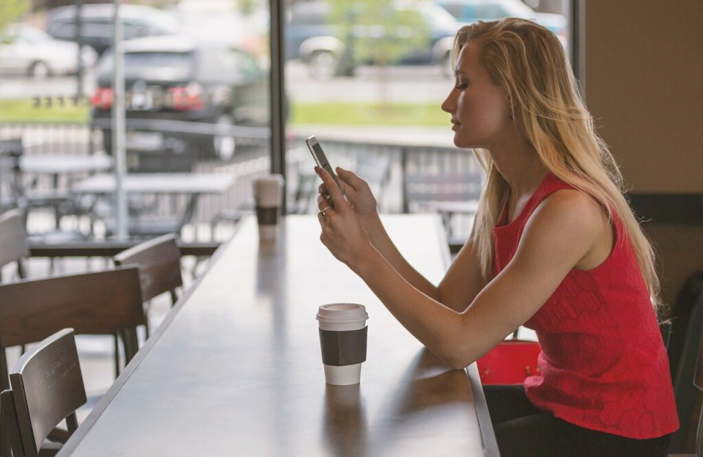 woman, sitting, counter