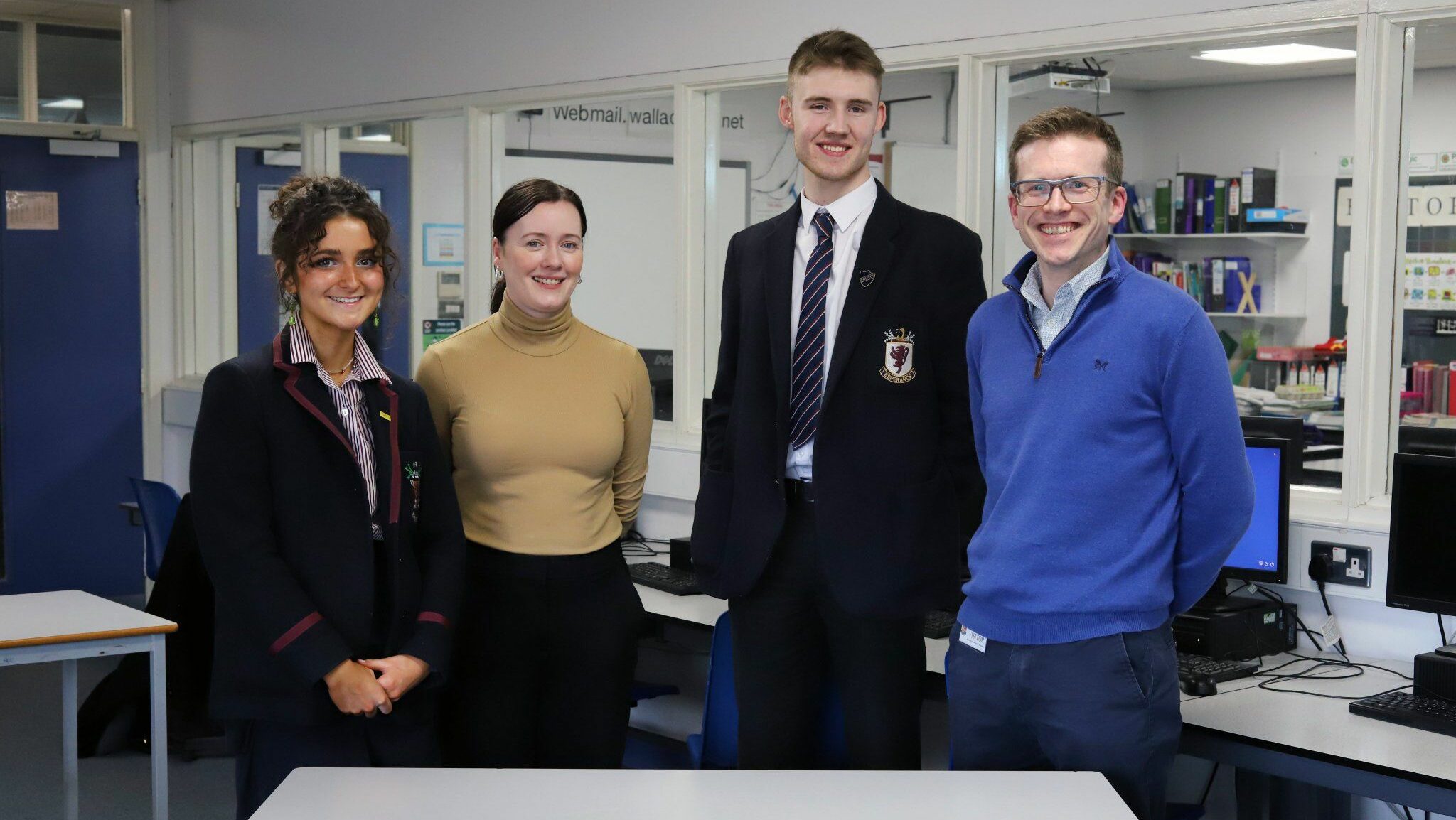 Pictures of two Datactics employees and two students from Wallace High School Lisburn after an AI Ethics talk